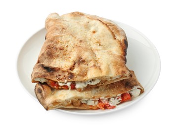 Halves of tasty calzone with meat, cheese, sauce and tomato isolated on white