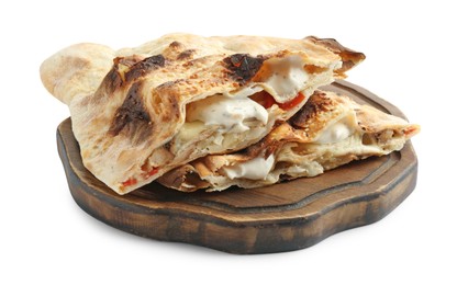 Photo of Halves of tasty calzone with meat, cheese, sauce and tomato isolated on white