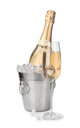 Photo of Champagne and bucket with ice isolated on white