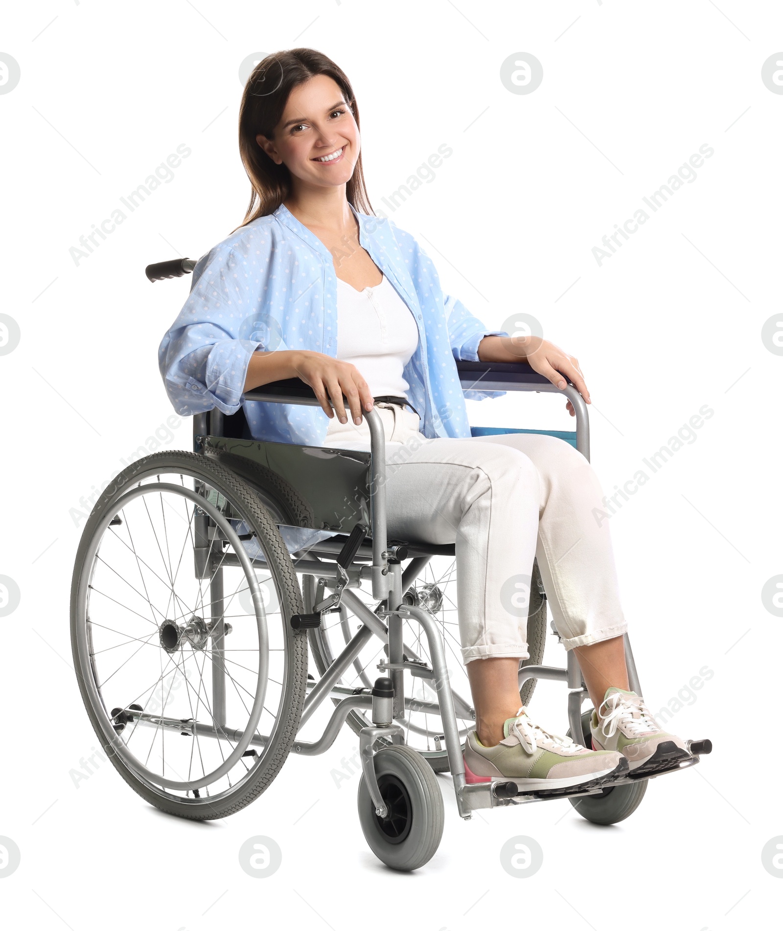 Photo of Smiling woman in wheelchair on white background