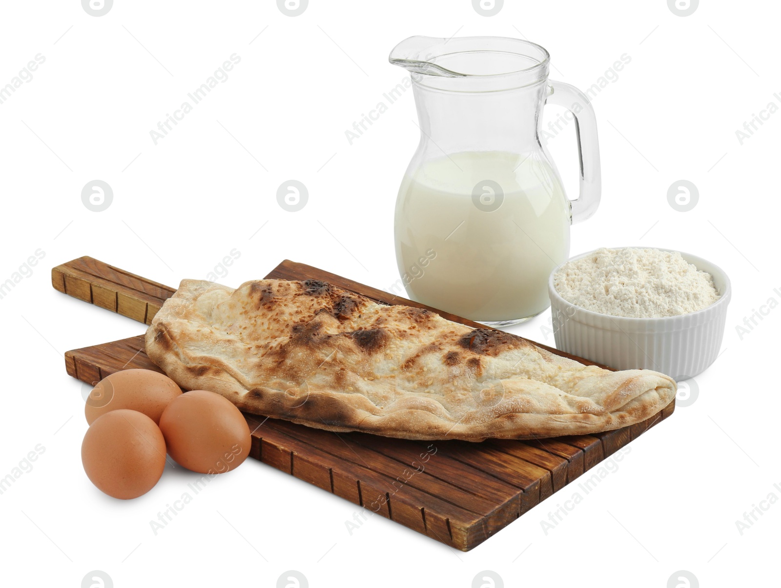 Photo of Delicious calzone and ingredients isolated on white