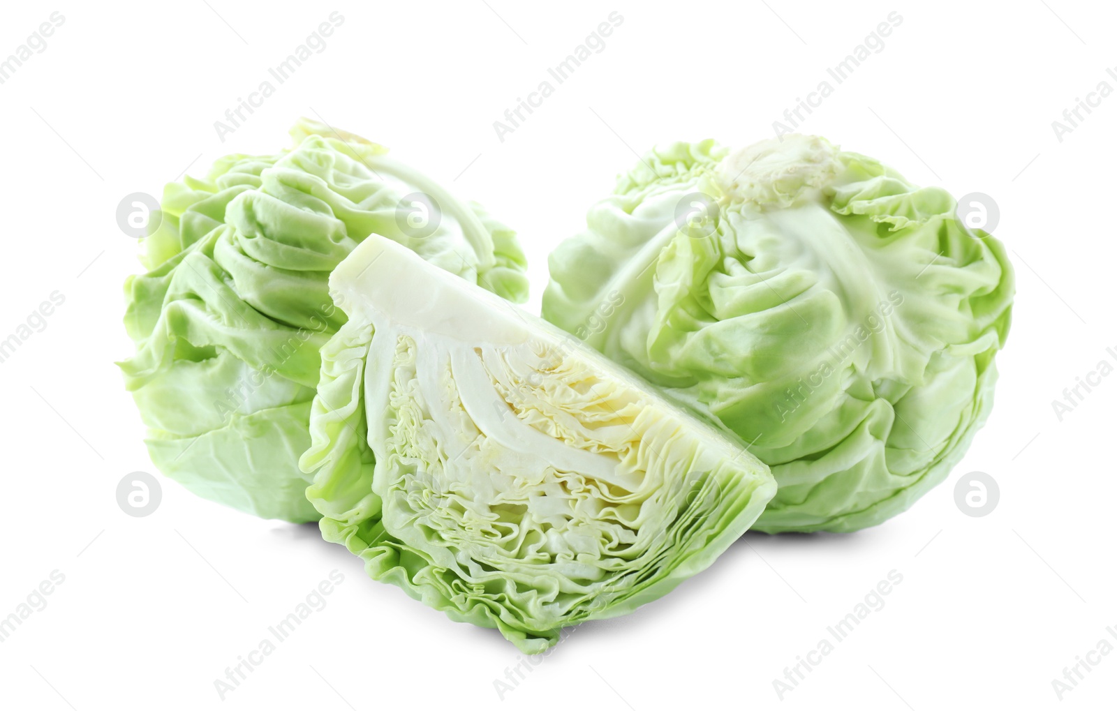 Photo of Whole and cut cabbages isolated on white