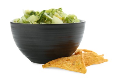 Photo of Delicious homemade green salsa with nachos isolated on white