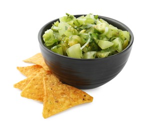 Photo of Delicious homemade green salsa with nachos isolated on white