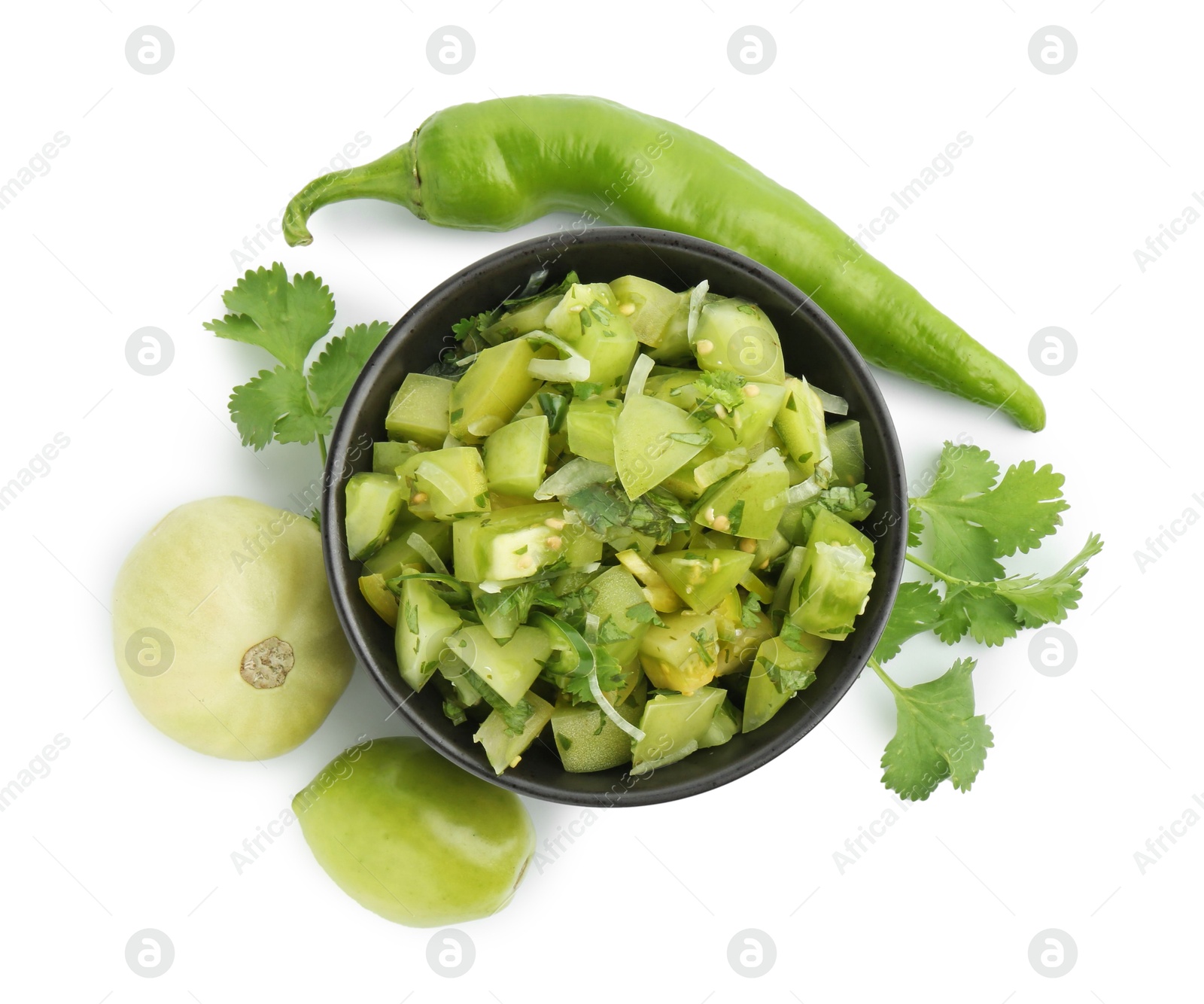 Photo of Delicious homemade green salsa and ingredients isolated on white, top view