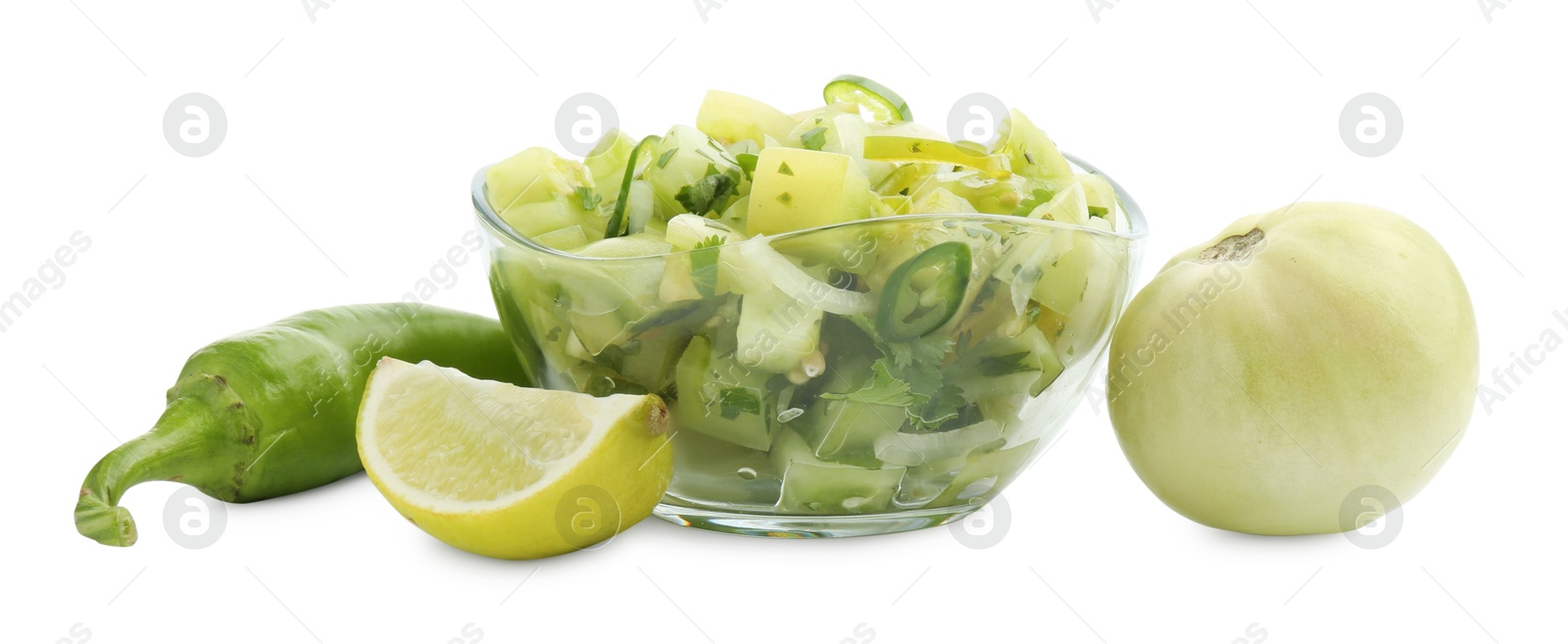 Photo of Delicious homemade green salsa and ingredients isolated on white