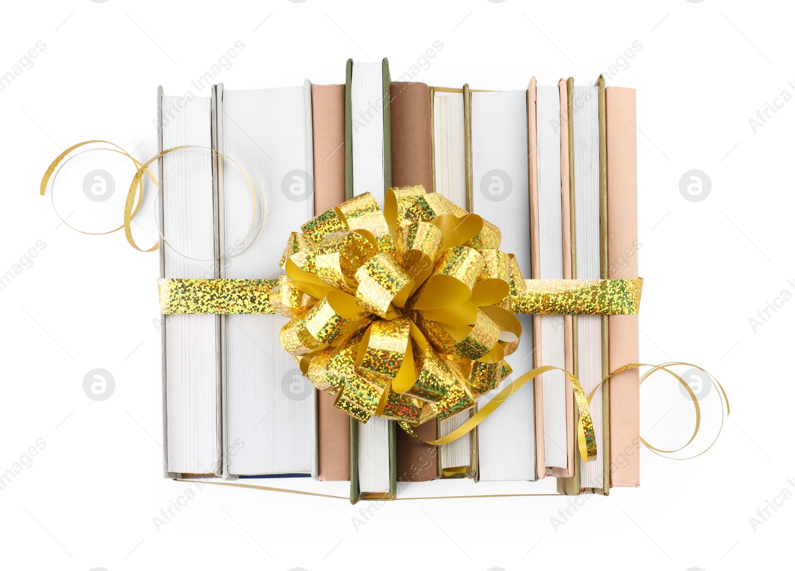 Photo of Books with golden bow as gift isolated on white, top view