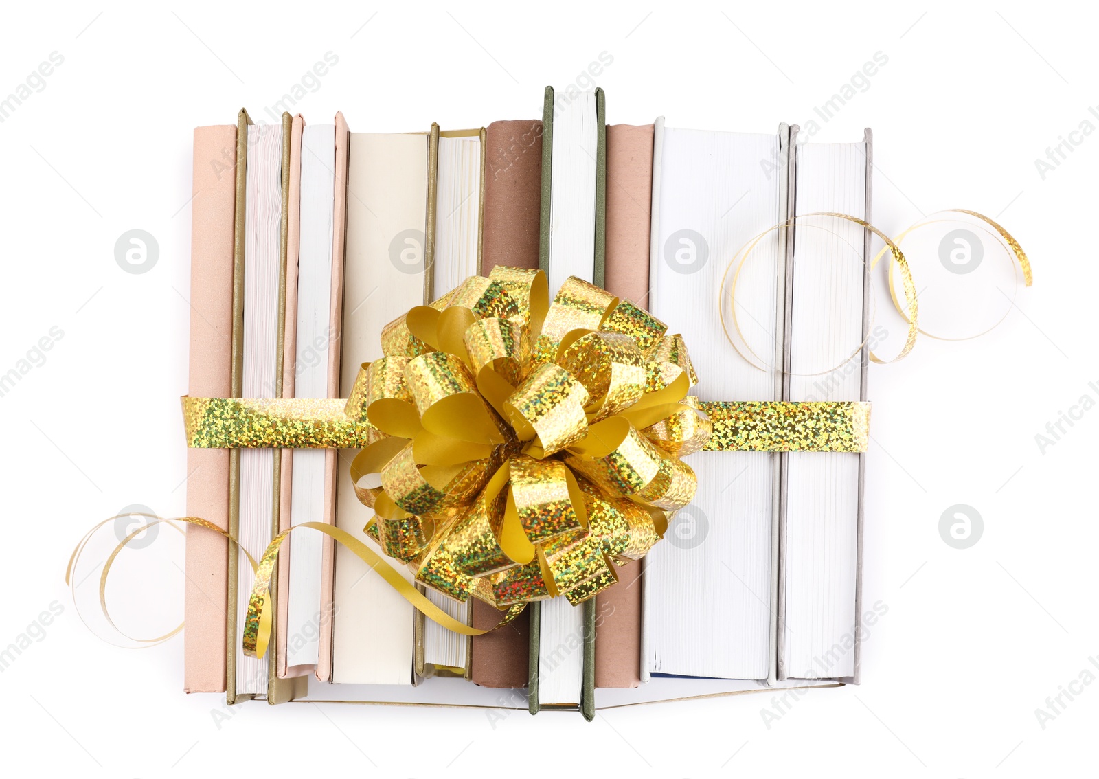 Photo of Books with golden bow as gift isolated on white, top view