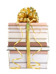 Photo of Stack of books with golden bow as gift isolated on white