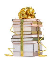 Photo of Stack of books with golden bow as gift isolated on white