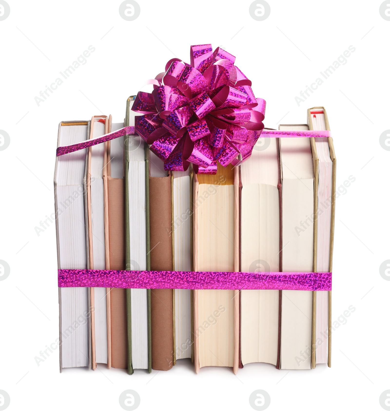 Photo of Books with purple bow as gift isolated on white