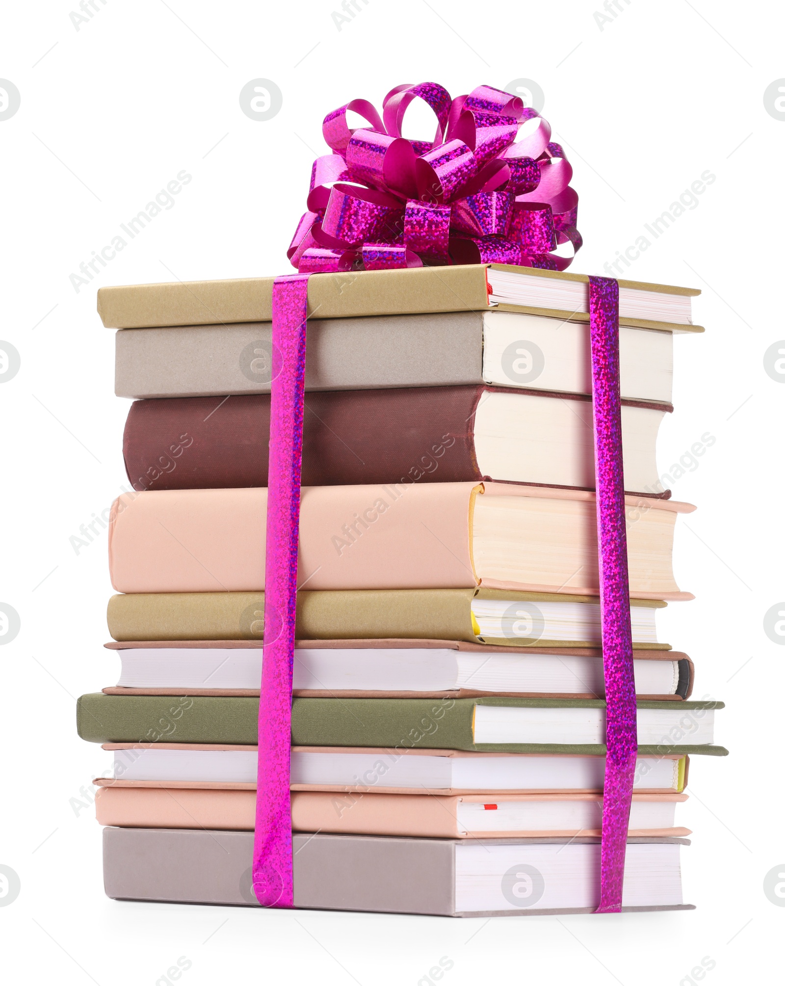 Photo of Stack of books with purple bow as gift isolated on white