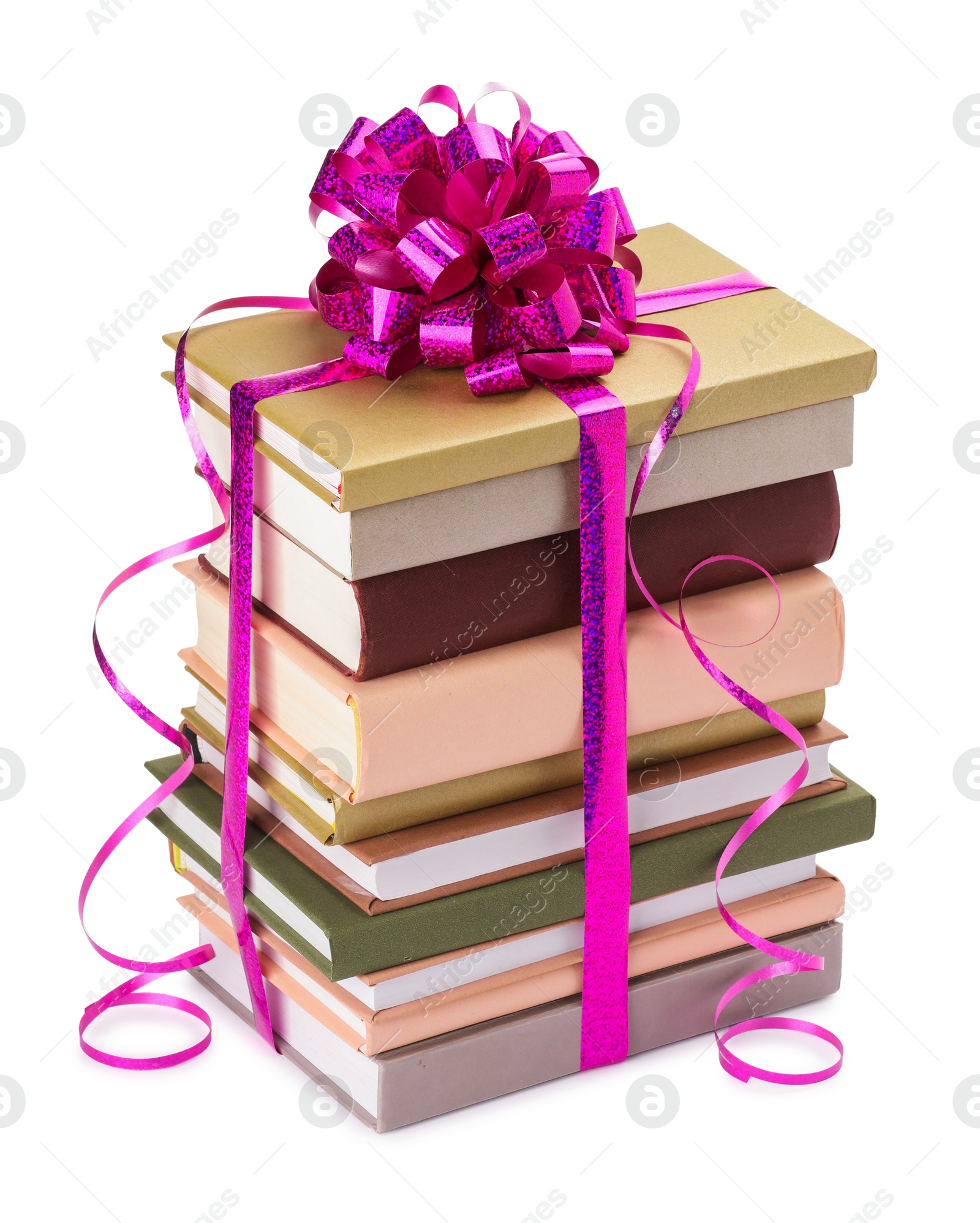 Photo of Stack of books with purple bow as gift isolated on white