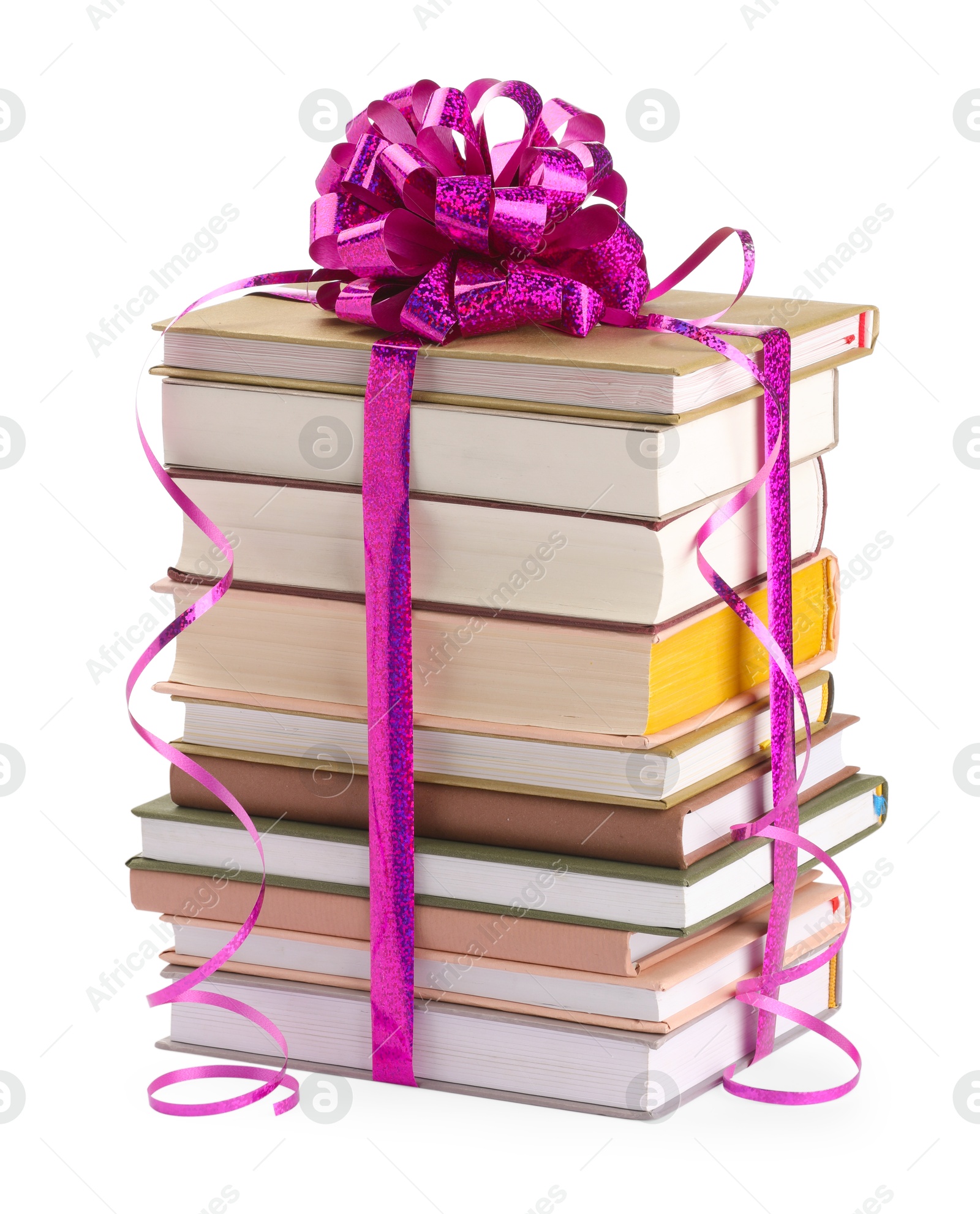 Photo of Stack of books with purple bow as gift isolated on white