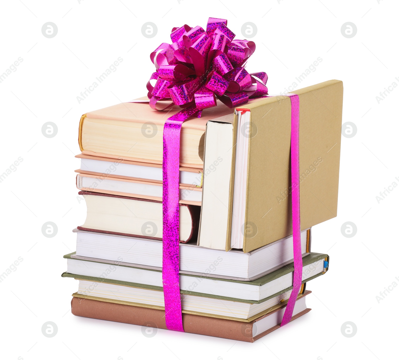 Photo of Stack of books with purple bow as gift isolated on white