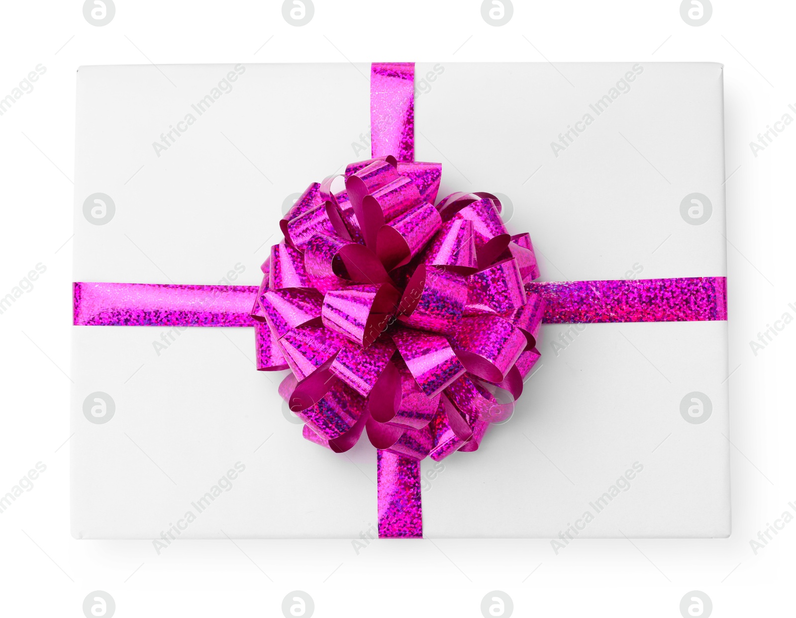 Photo of One book with purple bow as gift isolated on white, top view