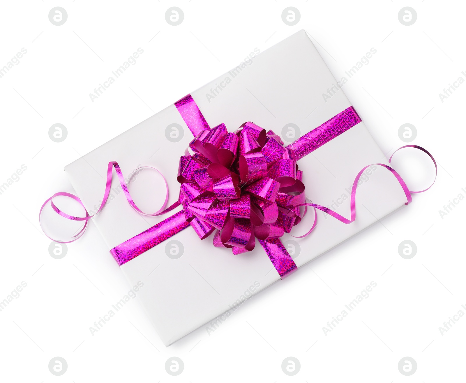 Photo of One book with purple bow as gift isolated on white, top view