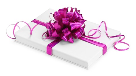 Photo of One book with purple bow as gift isolated on white