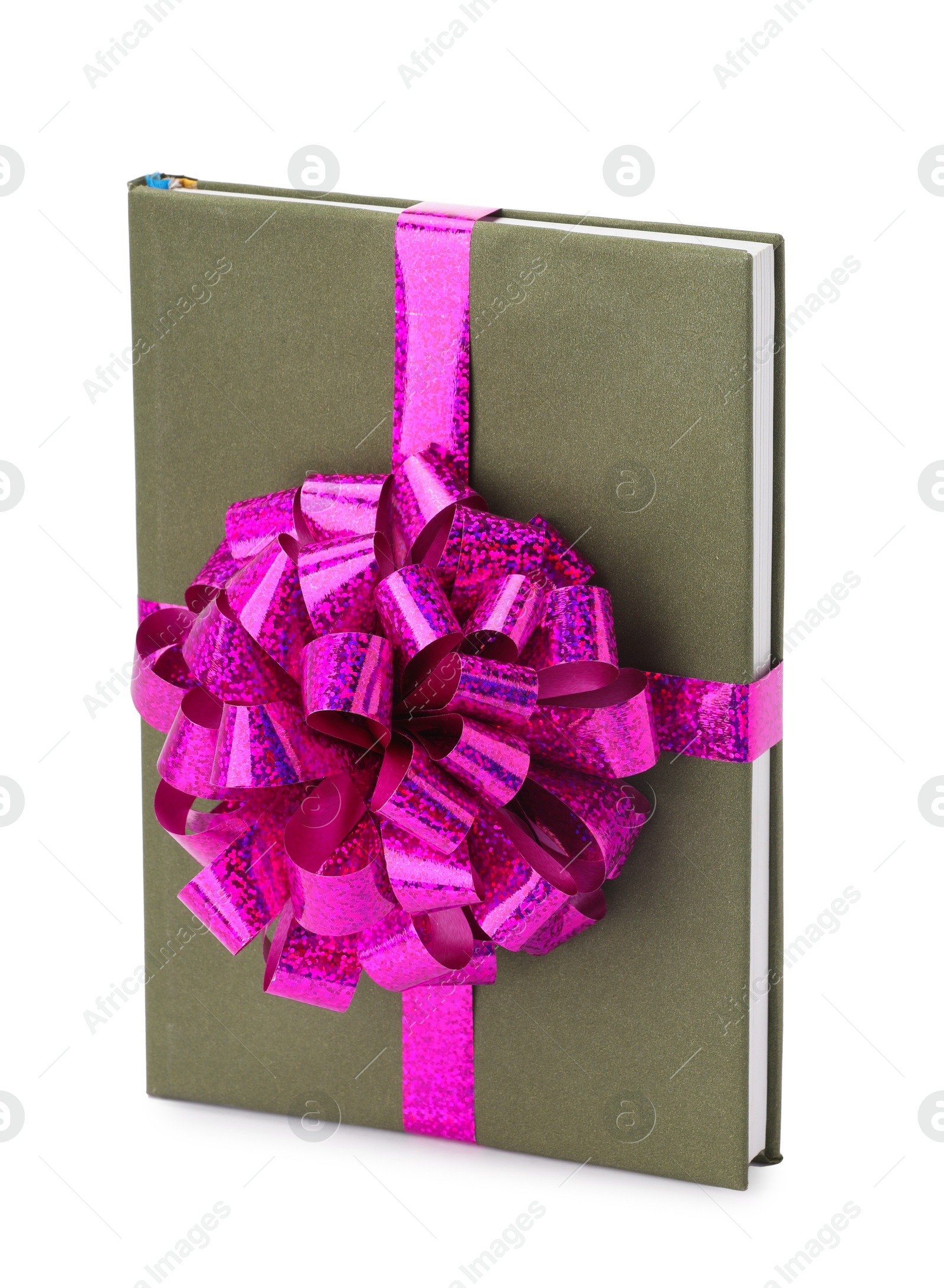 Photo of One book with purple bow as gift isolated on white