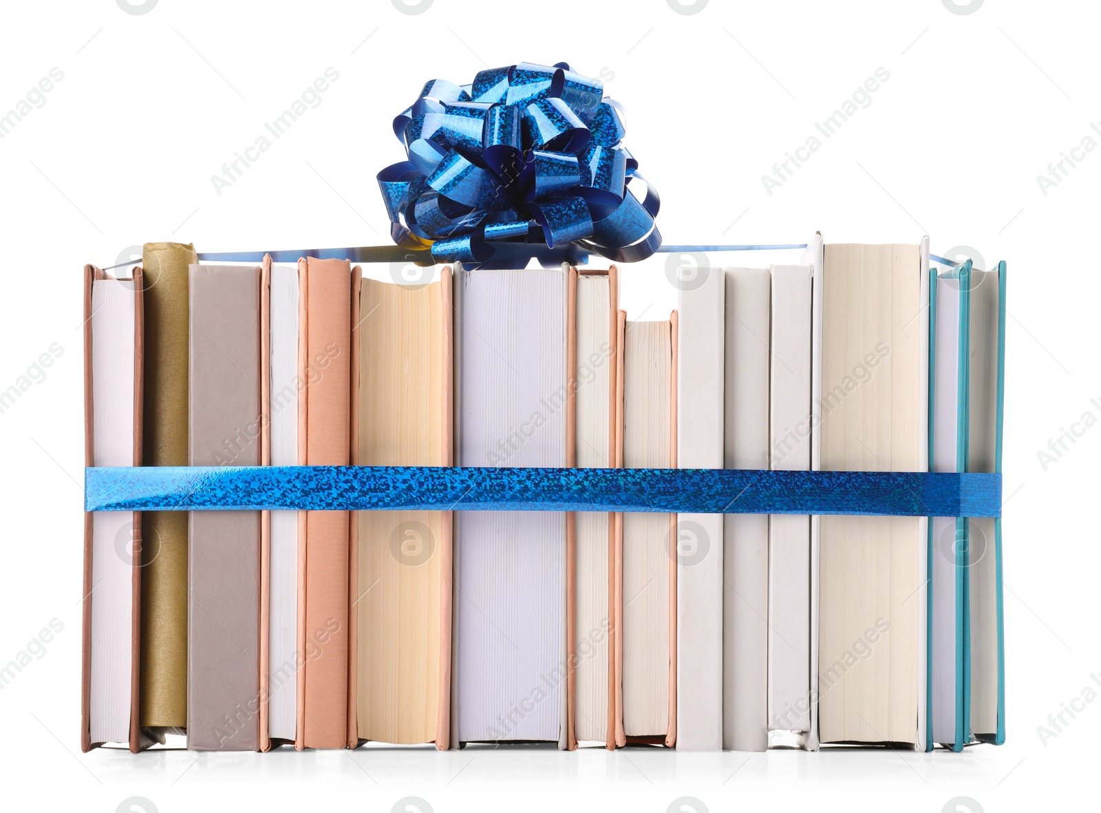 Photo of Books with blue bow as gift isolated on white