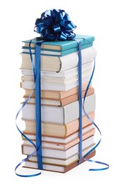 Photo of Stack of books with blue bow as gift isolated on white