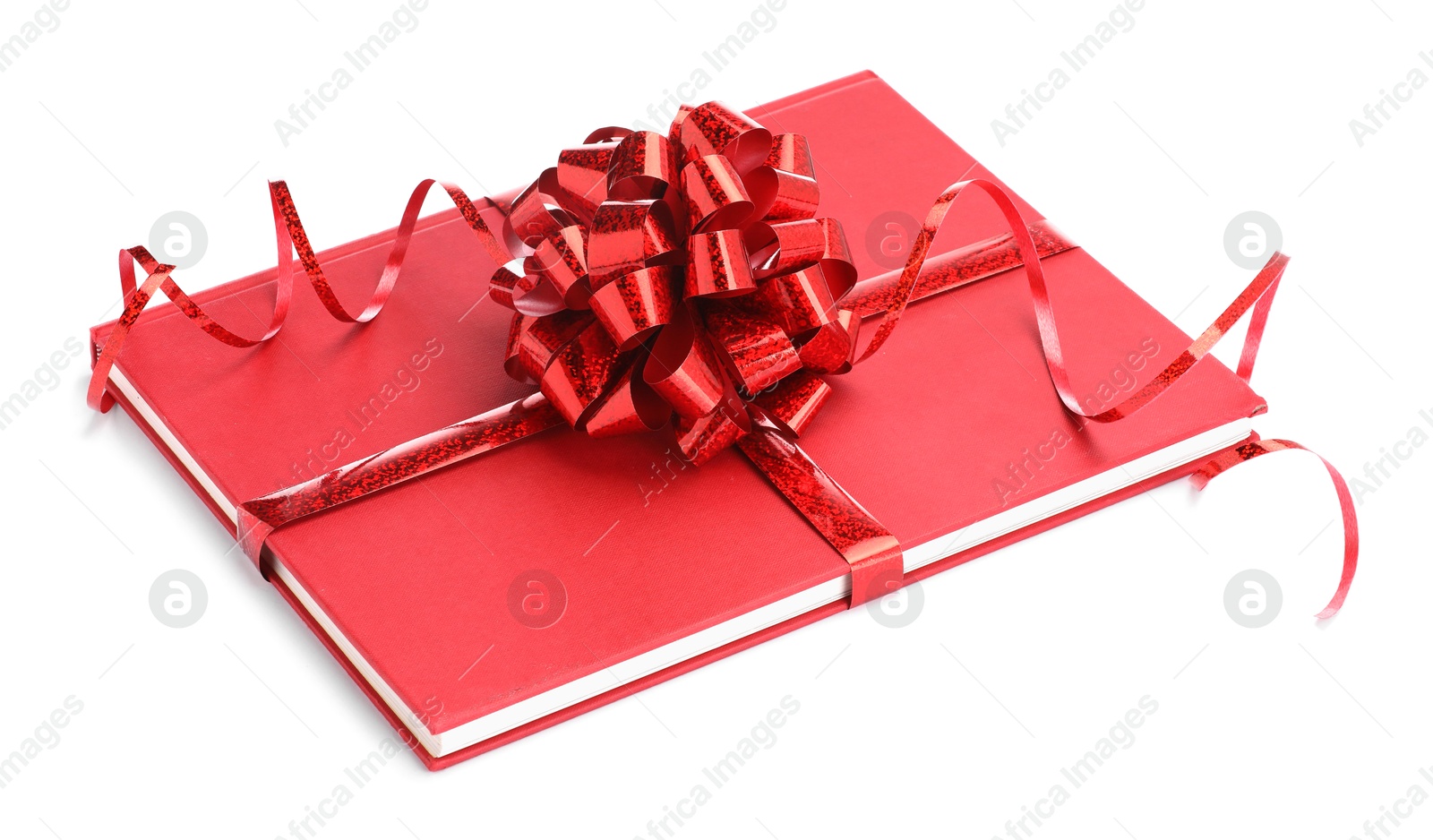 Photo of One book with red bow as gift isolated on white