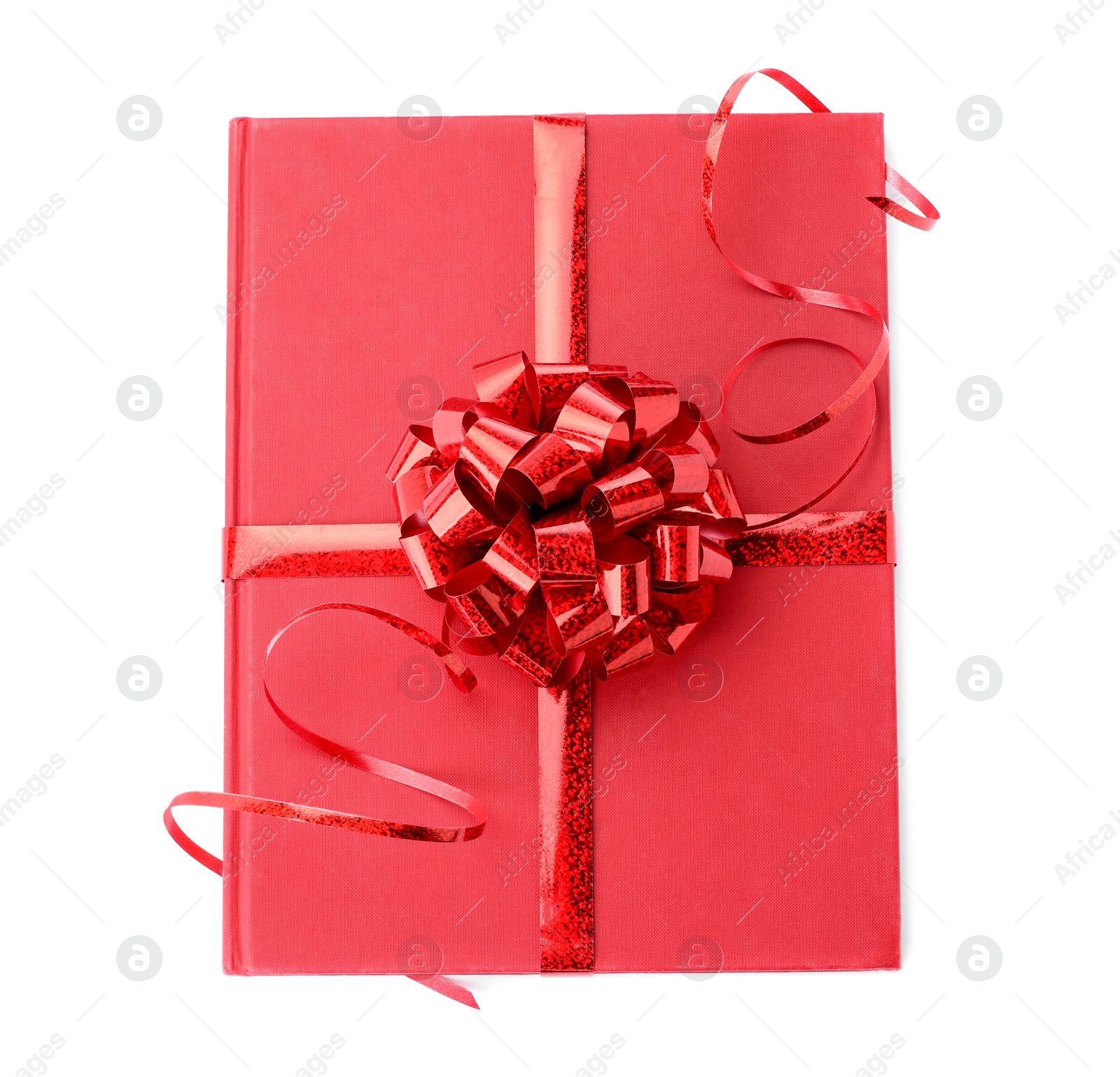 Photo of One book with red bow as gift isolated on white, top view