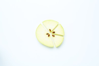 Photo of Pieces of fresh apple on white background, top view