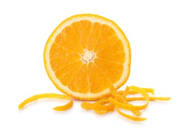 Photo of Half of fresh orange and zest isolated on white