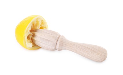 Photo of Wooden squeezer and lemon isolated on white