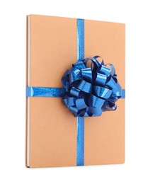 Photo of One book with blue bow as gift isolated on white