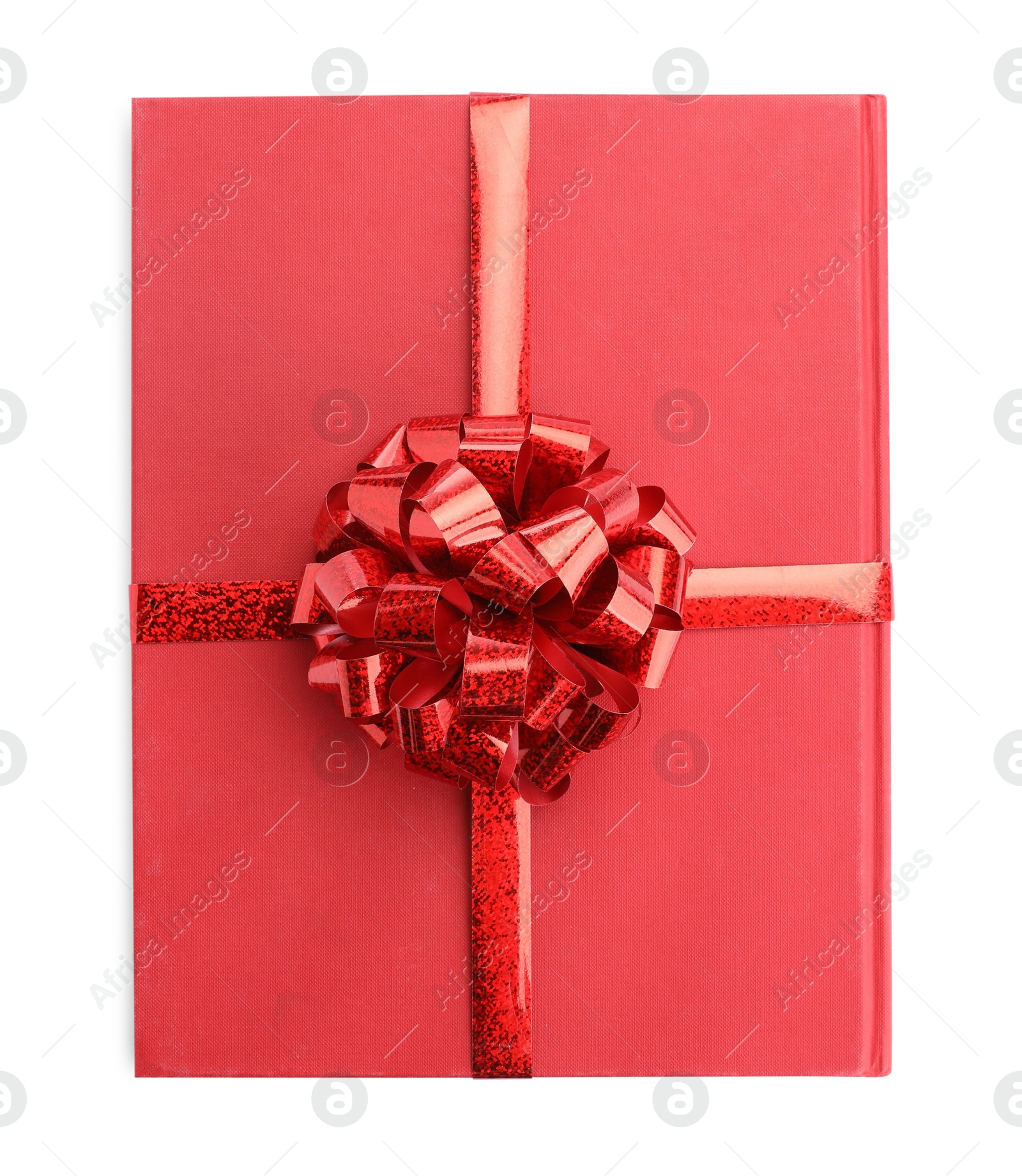 Photo of One book with red bow as gift isolated on white, top view