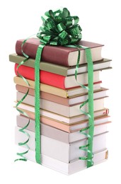 Photo of Stack of books with green bow as gift isolated on white