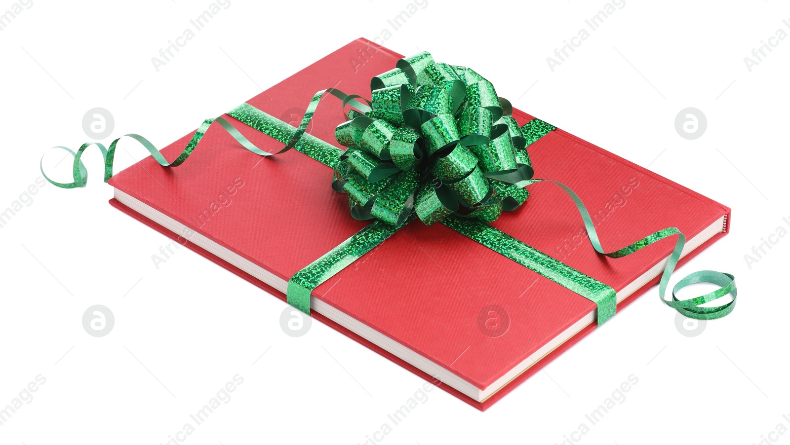 Photo of One book with green bow as gift isolated on white