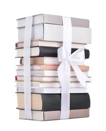 Photo of Stack of books with silk ribbon as gift isolated on white