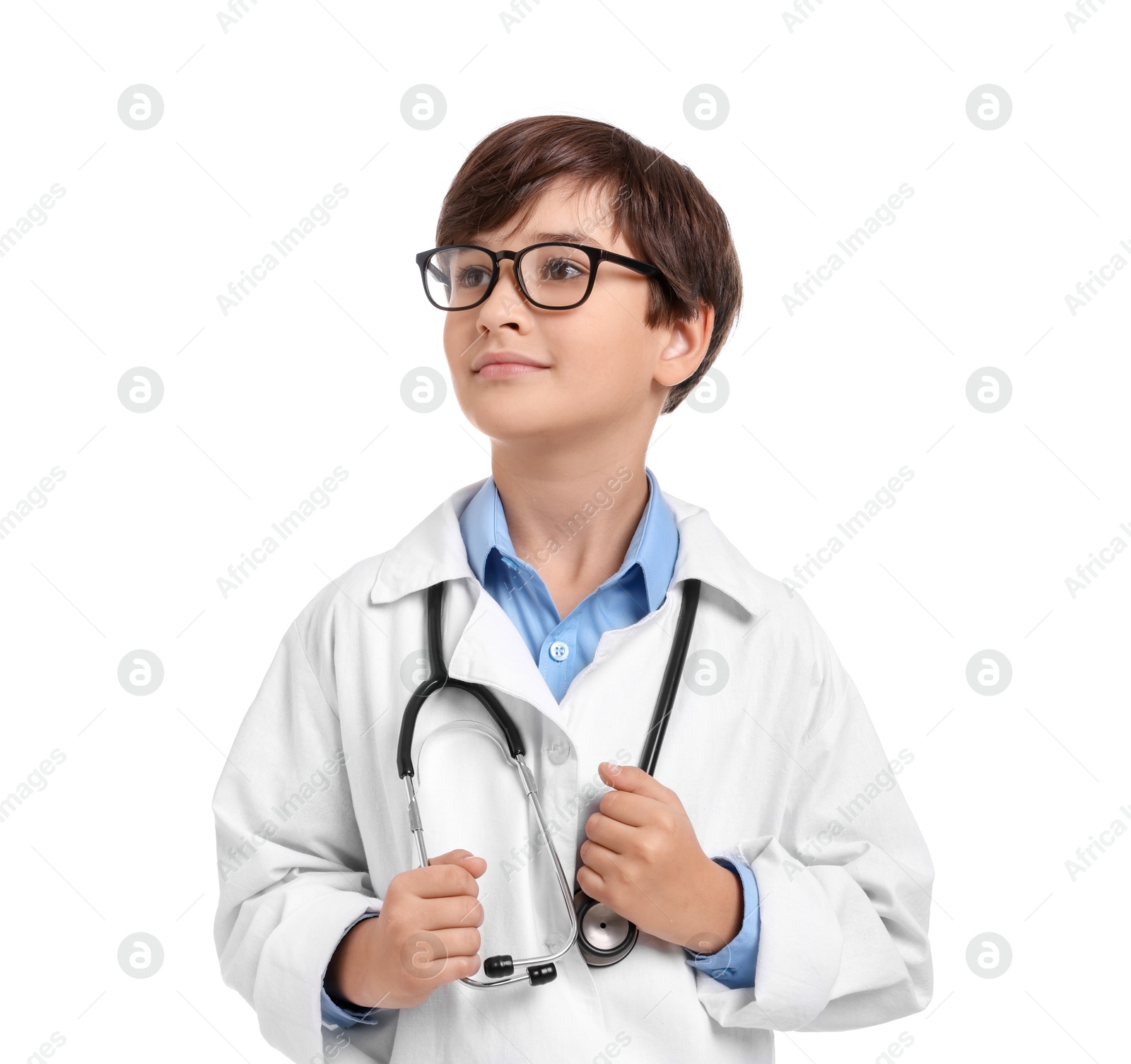 Photo of Boy with stethoscope pretending to be doctor on white background. Dreaming of future profession