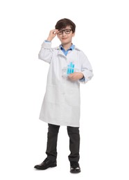 Photo of Boy with test tubes pretending to be scientist on white background. Dreaming of future profession