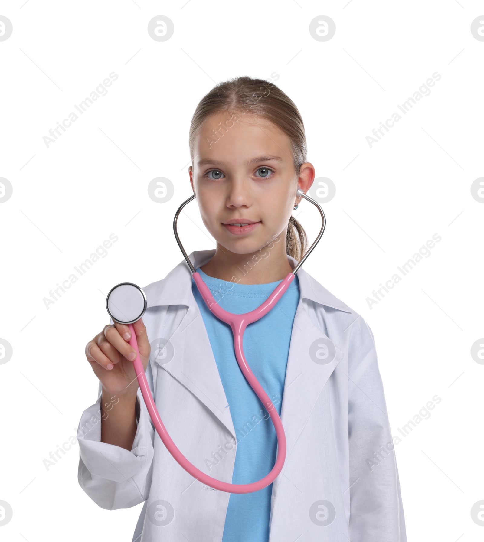 Photo of Girl with stethoscope pretending to be doctor on white background. Dreaming of future profession