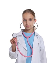 Photo of Girl with stethoscope pretending to be doctor on white background. Dreaming of future profession