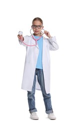 Photo of Girl with stethoscope pretending to be doctor on white background. Dreaming of future profession