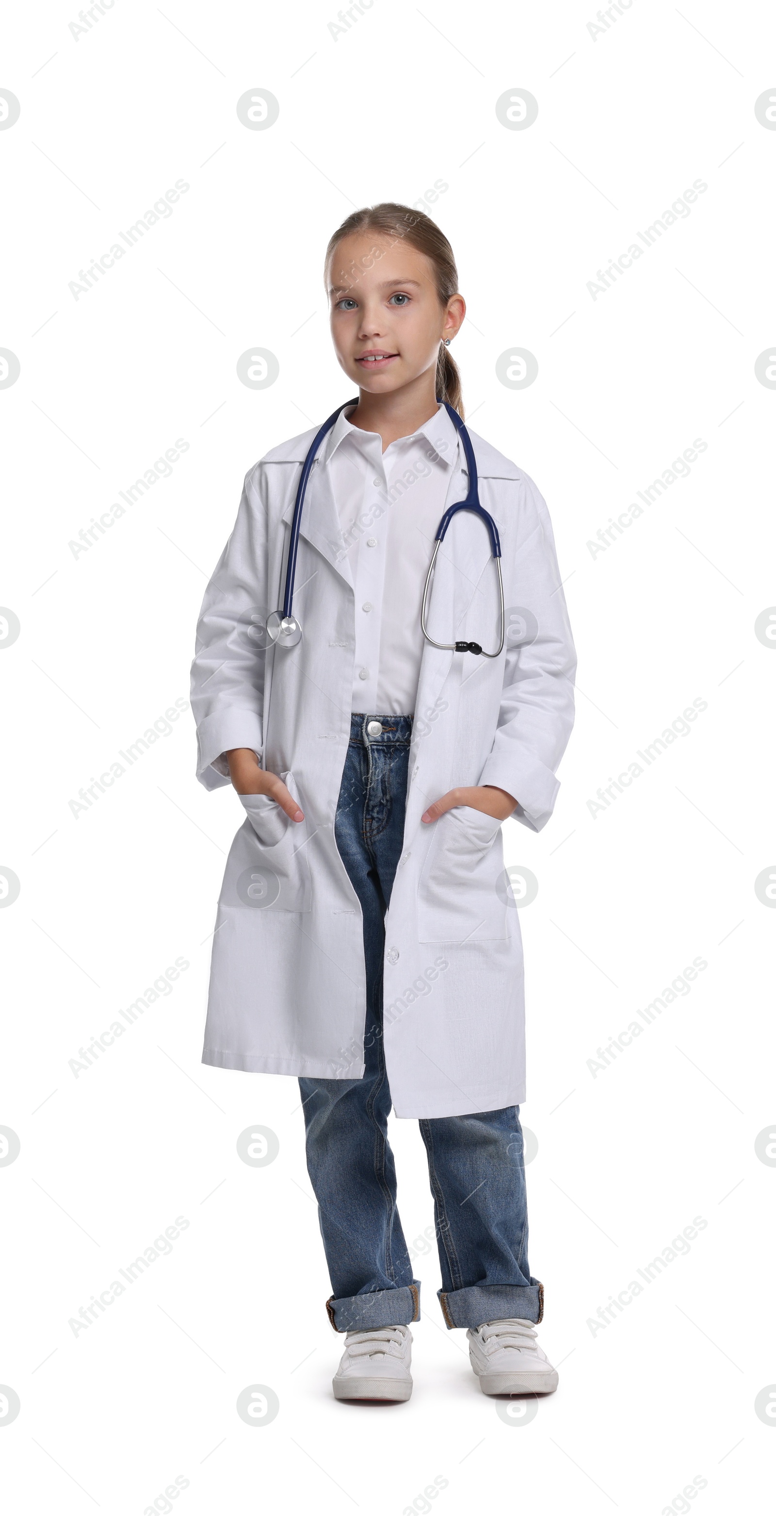 Photo of Girl with stethoscope pretending to be doctor on white background. Dreaming of future profession