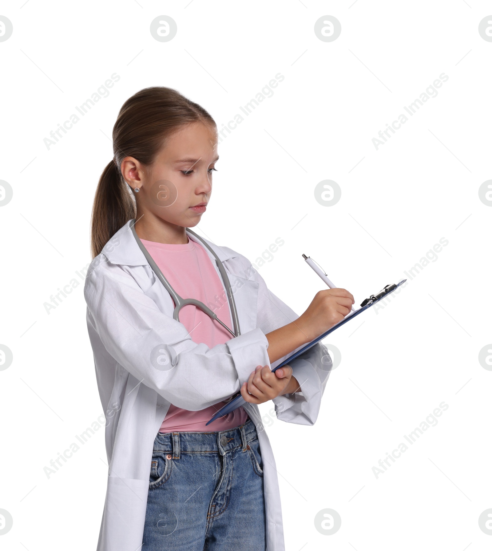 Photo of Girl with stethoscope and clipboard pretending to be doctor on white background. Dreaming of future profession