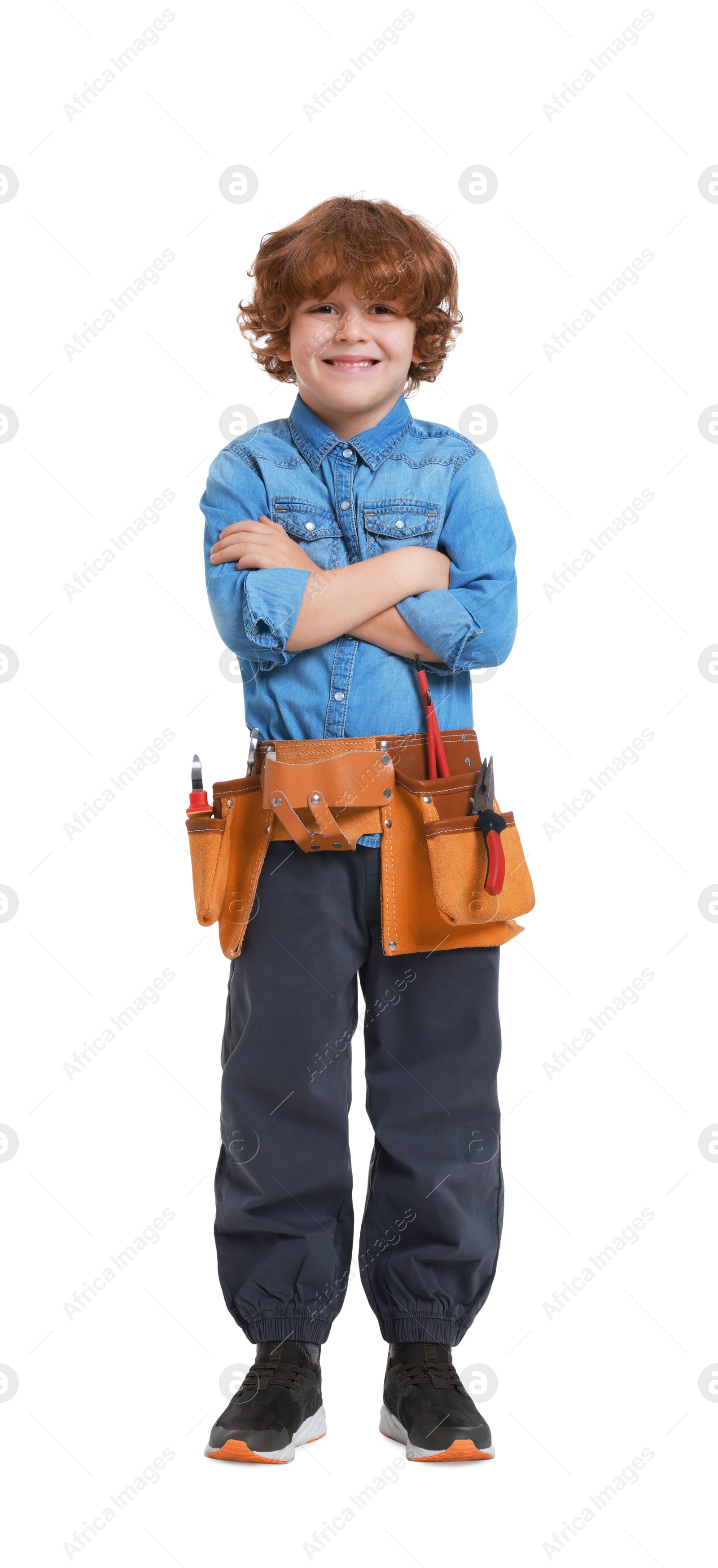 Photo of Little boy with tool belt on white background. Dreaming about future profession