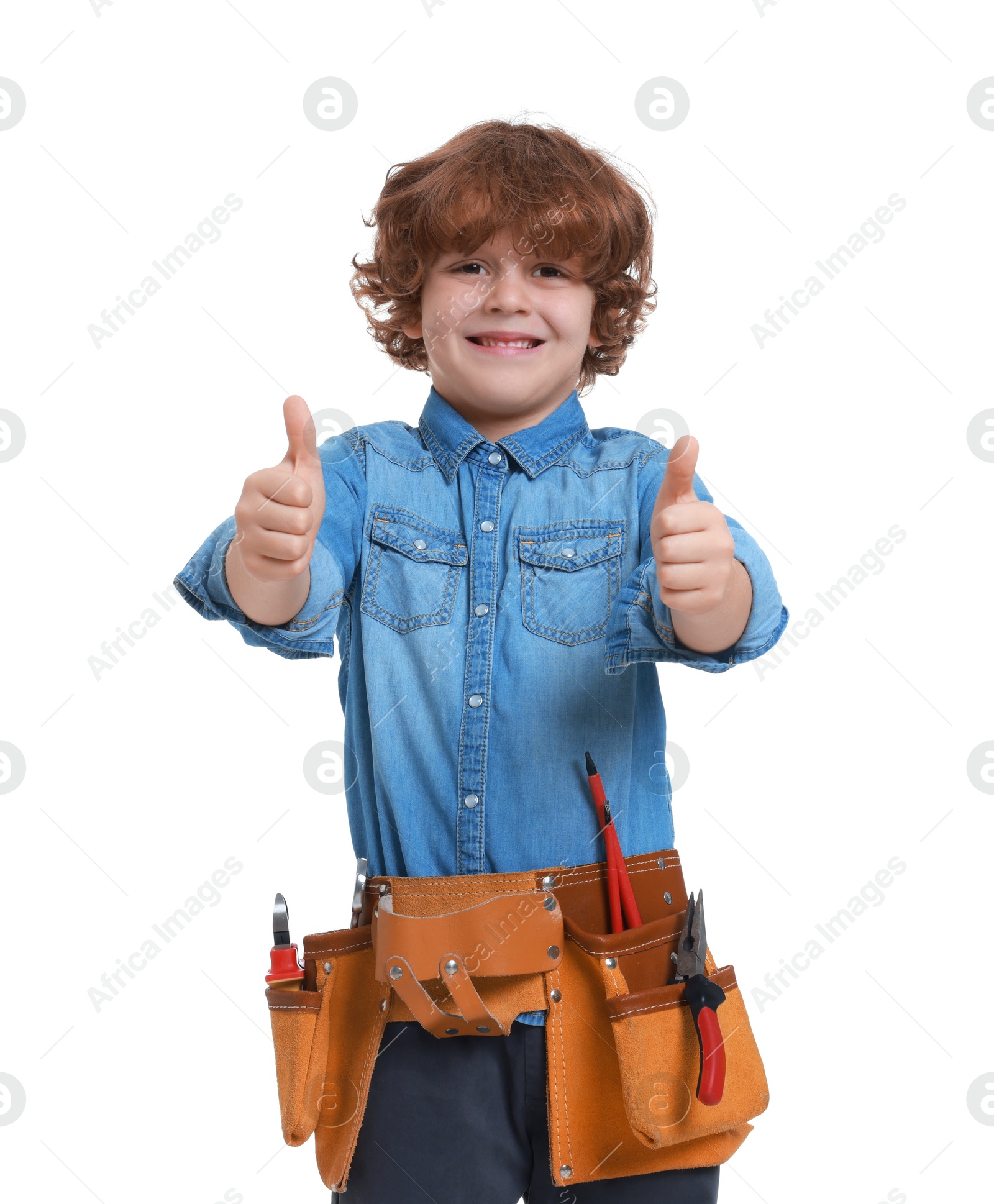 Photo of Little boy with tool belt showing thumbs up on white background. Dreaming about future profession