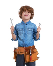 Photo of Little boy with tool belt and wrenches on white background. Dreaming about future profession