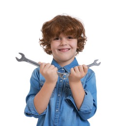 Photo of Little boy with wrenches on white background. Dreaming about future profession