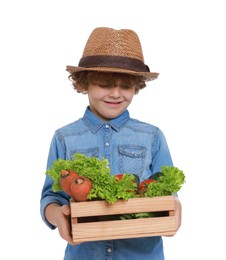 Photo of Little boy with vegetables pretending to be farmer on white background. Dreaming about future profession