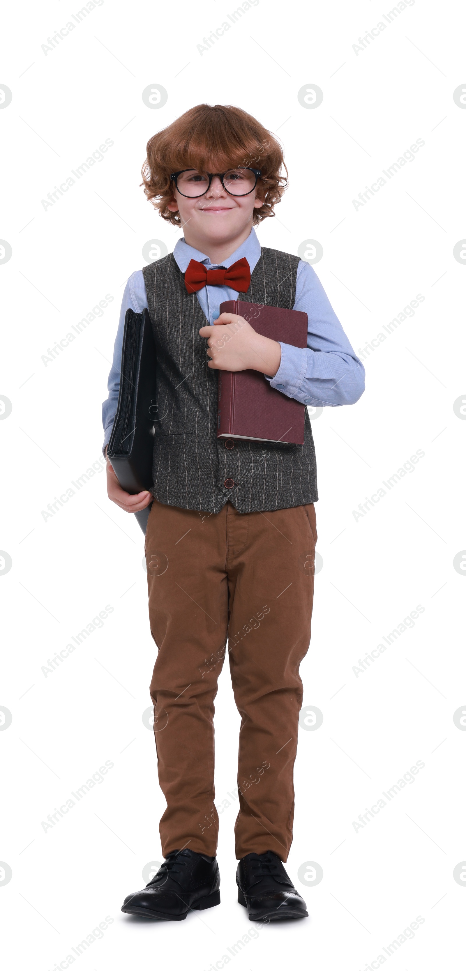 Photo of Little boy with book and folder on white background. Dreaming about future profession