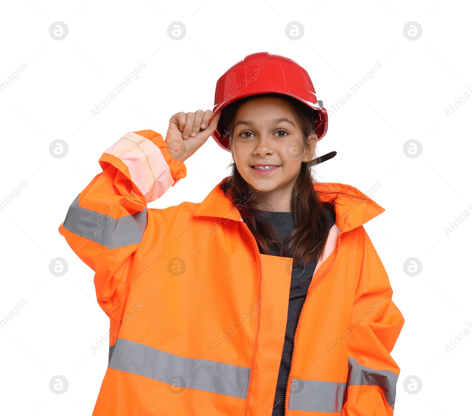 Photo of Girl with hardhat and vest pretending to be firefighter on white background. Dreaming of future profession