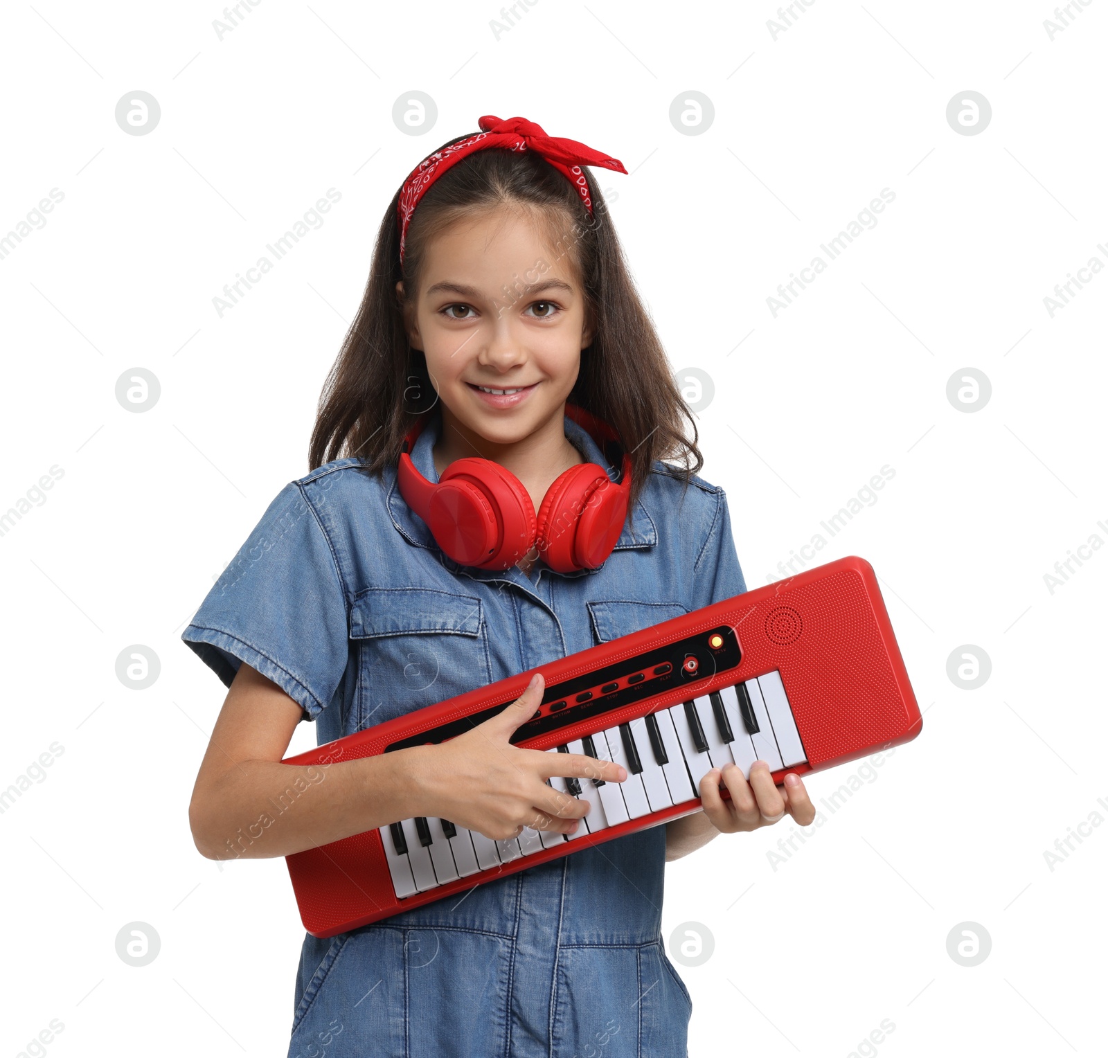 Photo of Girl with headphones and electric piano pretending to be musician on white background. Dreaming of future profession